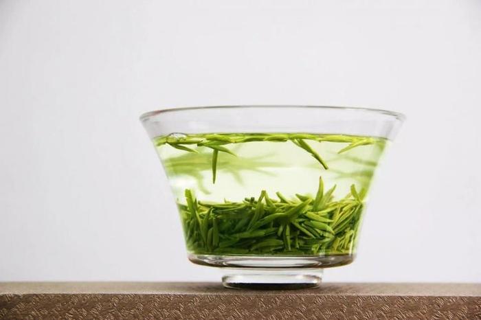 绿茶煮水什么功效,绿茶煮着喝会对身体有害吗